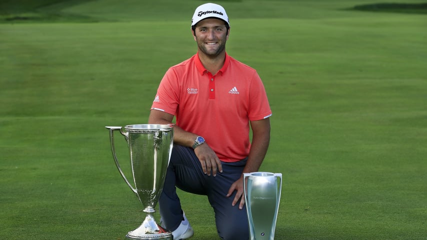 OLYMPIA FIELDS, ILLINOIS - AUGUST 30: Jon Rahm of Spain celebrates with the J.D. Wadley trophy and the BMW trophy after winning on the first sudden-death-playoff hole against Dustin Johnson (not pictured) during the final round of the BMW Championship on the North Course at Olympia Fields Country Club on August 30, 2020 in Olympia Fields, Illinois. (Photo by Andy Lyons/Getty Images)