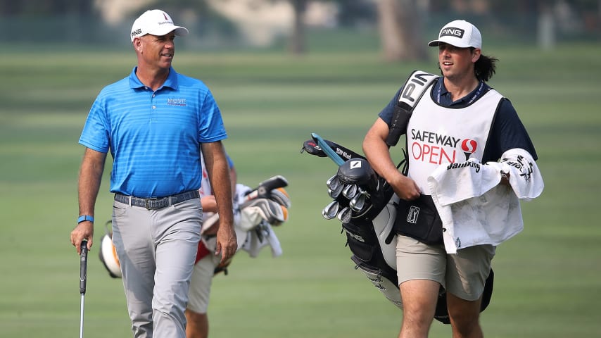 NAPA, CALIFORNIA - SEPTEMBER 13: Stewart Cink walks with his son Reagan, as his caddie, on the 13th hole during the final round of the Safeway Open at Silverado Resort on September 13, 2020 in Napa, California. (Photo by Sean M. Haffey/Getty Images)