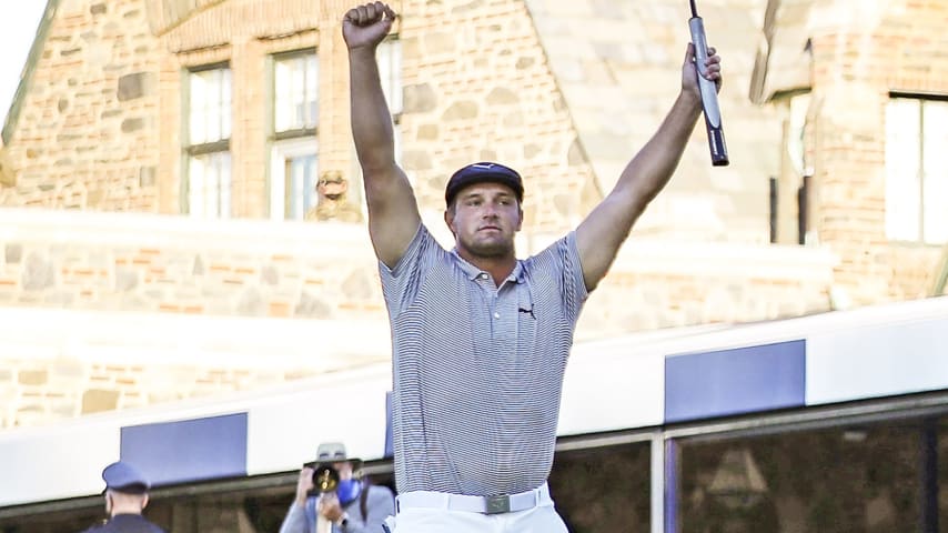 MAMARONECK, NEW YORK - SEPTEMBER 20: Bryson DeChambeau of the United States celebrates on the 18th green after winning during the final round of the 120th U.S. Open Championship on September 19, 2020 at Winged Foot Golf Club in Mamaroneck, New York. (Photo by Jamie Squire/Getty Images)