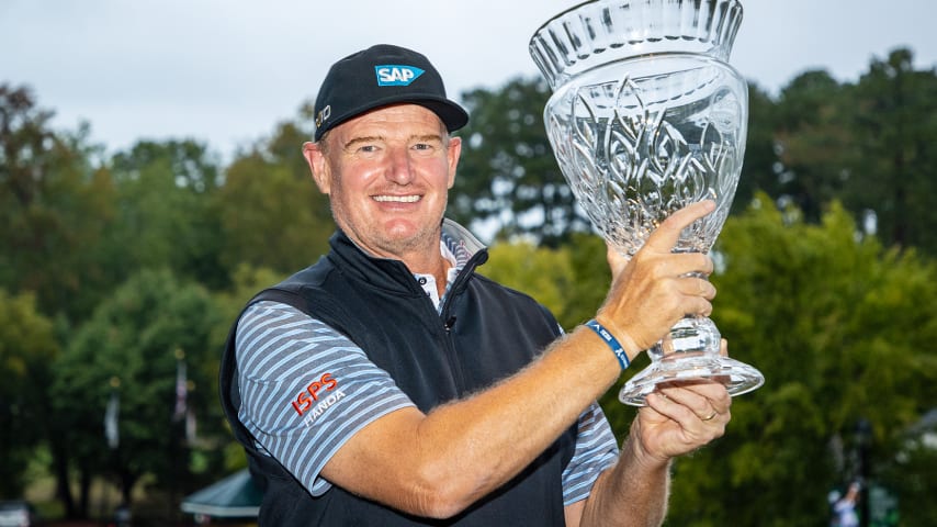 CARY, NC - OCTOBER 11: Ernie Ells of South Africa poses with the trophy after winning during the final round of the SAS Championship at Prestonwood Country Club on October 11, 2020 in Cary, North Carolina. (Photo by Chris Keane/Getty Images)