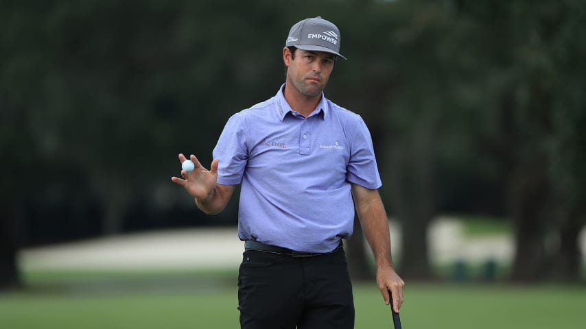 ST SIMONS ISLAND, GEORGIA - NOVEMBER 22: Robert Streb of the United States waves after making par on the 18th green to force a playoff with Kevin Kisner (not pictured) during the final round of The RSM Classic at the Seaside Course at Sea Island Golf Club on November 22, 2020 in St Simons Island, Georgia. (Photo by Sam Greenwood/Getty Images)