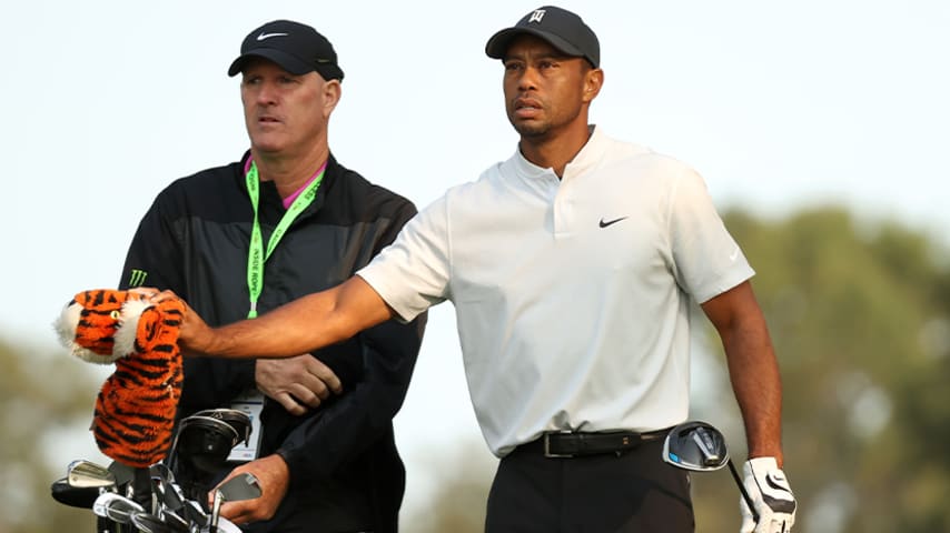 Woods' father-son team joined by LaCava father-son caddie duo