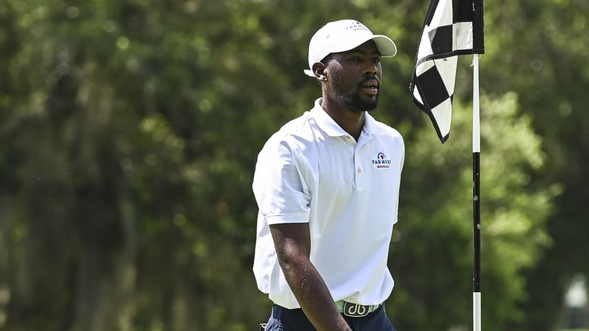 ST. AUGUSTINE, FL - JULY 10:  Kamaiu Johnson walks off the ninth hole green during the final round of an APGA Tour event on the Slammer & Squire Course at World Golf Village on July 10, 2020 in Saint Augustine, Florida. (Photo by Keyur Khamar/PGA TOUR via Getty Images)