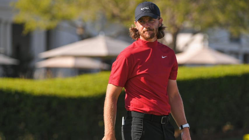 Players, staff support Tiger Woods by wearing red on Sunday