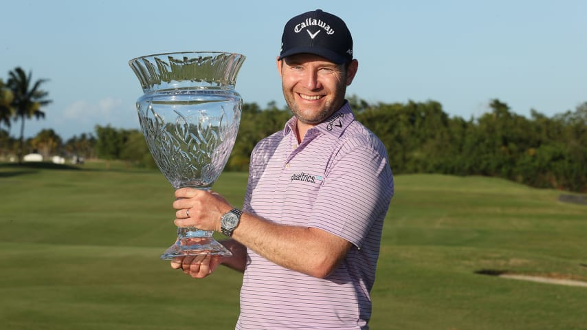 RIO GRANDE, PUERTO RICO - FEBRUARY 28:  Branden Grace of South Africa holds the winner's trophy after winning the Puerto Rico Open at Grand Reserve Country Club on February 28, 2021 in Rio Grande, Puerto Rico. (Photo by Andy Lyons/Getty Images)