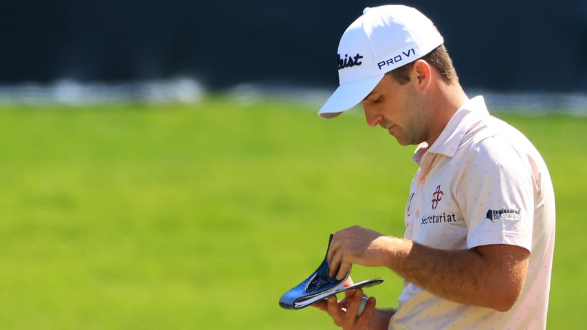 PONTE VEDRA BEACH, FLORIDA - MARCH 12: Denny McCarthy of the United States checks his yardage book on the ninth green during the second round of THE PLAYERS Championship on THE PLAYERS Stadium Course at TPC Sawgrass on March 12, 2021 in Ponte Vedra Beach, Florida. (Photo by Mike Ehrmann/Getty Images)