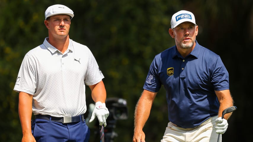 PONTE VEDRA BEACH, FLORIDA - MARCH 14: Bryson DeChambeau of the United States and Lee Westwood of England look on from the second tee during the final round of THE PLAYERS Championship on THE PLAYERS Stadium Course at TPC Sawgrass on March 14, 2021 in Ponte Vedra Beach, Florida. (Photo by Kevin C. Cox/Getty Images)