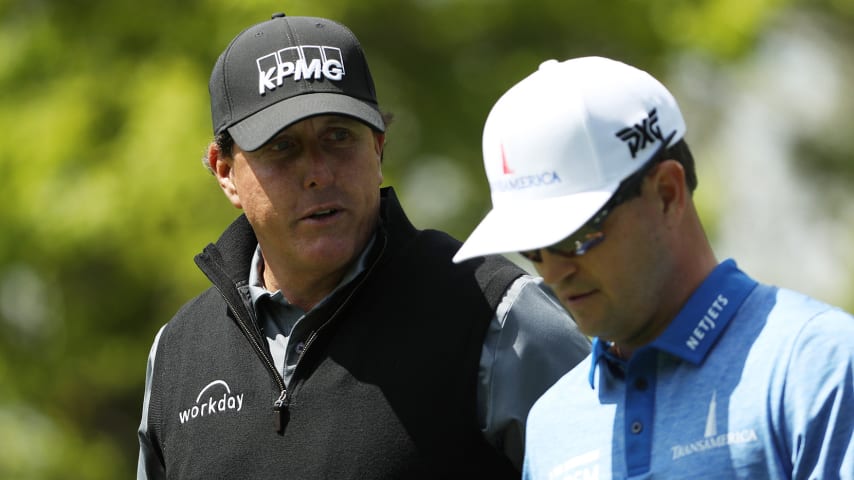 FARMINGDALE, NEW YORK - MAY 15: Phil Mickelson of the United States and Zach Johnson of the United States walk from the 14th tee during a practice round prior to the 2019 PGA Championship at the Bethpage Black course on May 15, 2019 in Farmingdale, New York. (Photo by Patrick Smith/Getty Images)