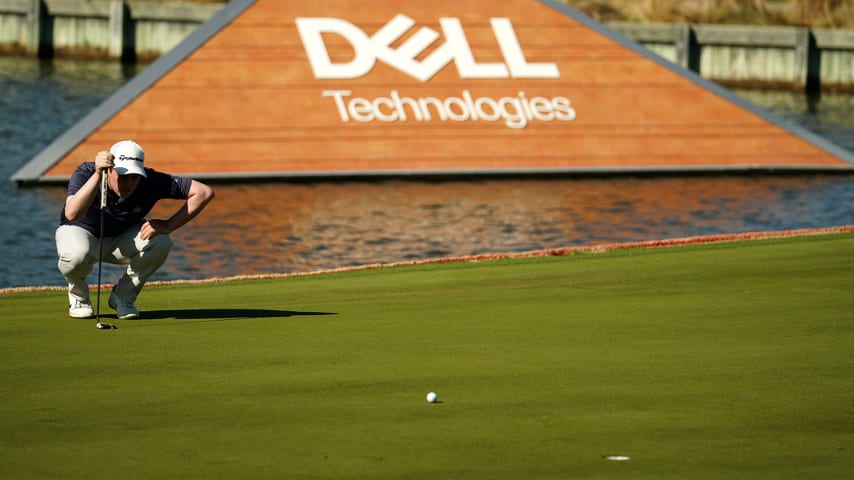 AUSTIN, TEXAS - MARCH 25: Robert MacIntyre of Scotland lines up a putt on the 13th green in his match against Dustin Johnson of the United States during the second round of the World Golf Championships-Dell Technologies Match Play at Austin Country Club on March 25, 2021 in Austin, Texas. (Photo by Darren Carroll/Getty Images)