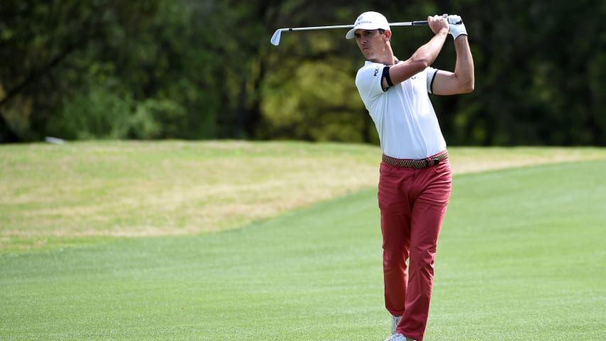 AUSTIN, TEXAS - MARCH 28: Billy Horschel of the United States plays his shot on the sixth hole in his match against Scottie Scheffler of the United States during the final round of the World Golf Championships-Dell Technologies Match Play at Austin Country Club on March 28, 2021 in Austin, Texas. (Photo by Steve Dykes/Getty Images)