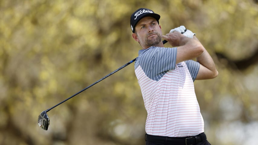 AUSTIN, TEXAS - MARCH 26: Webb Simpson of the United States plays his shot on the eighth tee in his match against Paul Casey of England during the third round of the World Golf Championships-Dell Technologies Match Play at Austin Country Club on March 26, 2021 in Austin, Texas. (Photo by Michael Reaves/Getty Images)