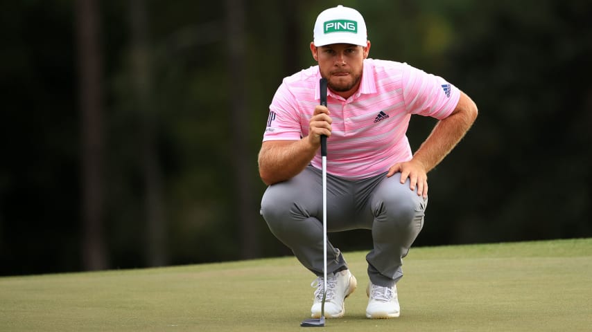 AUGUSTA, GEORGIA - APRIL 08: Tyrrell Hatton of England lines up a putt on the 18th green during the first round of the Masters at Augusta National Golf Club on April 08, 2021 in Augusta, Georgia. (Photo by Mike Ehrmann/Getty Images)