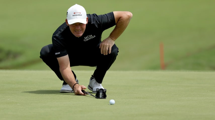 TULSA, OKLAHOMA - MAY 30: Alex Cejka of Germany lines up a putt on the 13th green during the Final Round of the Senior PGA Championship at Southern Hills Country Club on May 30, 2021 in Tulsa, Oklahoma. (Photo by Dylan Buell/Getty Images)