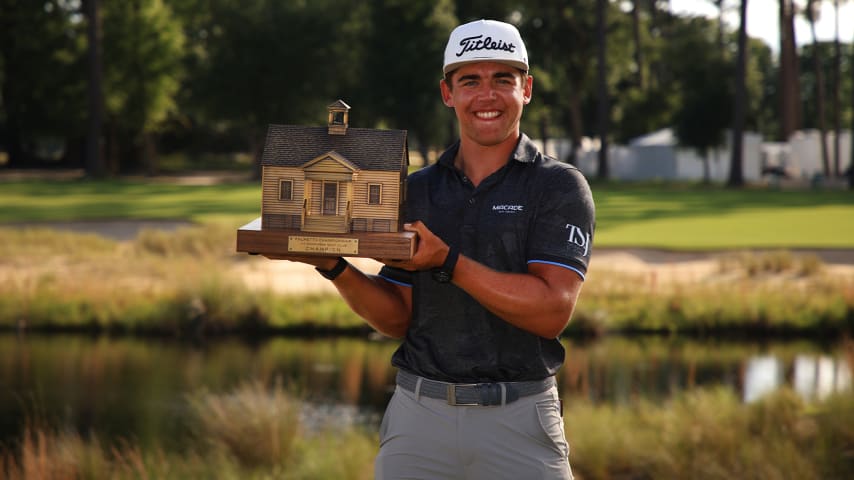 RIDGELAND, SOUTH CAROLINA - JUNE 13: Garrick Higgo of South Africa poses with the trophy after winning on the 18th green during the final round of the Palmetto Championship at Congaree on June 13, 2021 in Ridgeland, South Carolina. (Photo by Mike Ehrmann/Getty Images)
