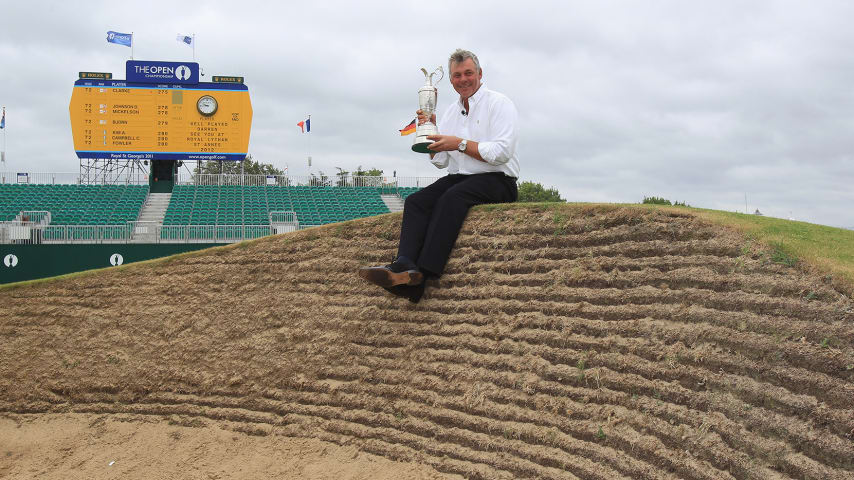 SANDWICH, ENGLAND - JULY 18:  Darren Clarke of Northern Ireland poses with the Claret Jug on the 18th green following his victory in The 140th Open Championship at Royal St George's on July 18, 2011 in Sandwich, England.  (Photo by Streeter Lecka/Getty Images)