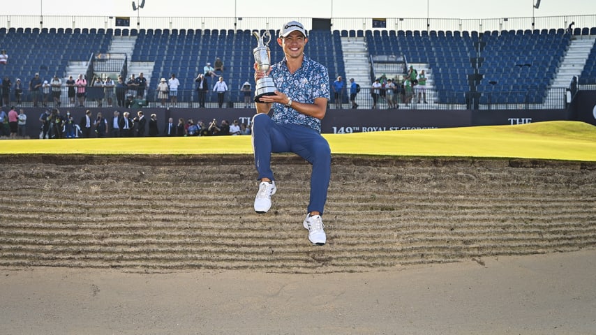 SANDWICH, ENGLAND - JULY 18:  Collin Morikawa smiles with the Claret Jug trophy following his two stroke victory on the 18th hole green during Day Four of the 149th The Open Championship at Royal St. Georgeâs Golf Club on July 18, 2021 in Sandwich, England. (Photo by Keyur Khamar/PGA TOUR via Getty Images)