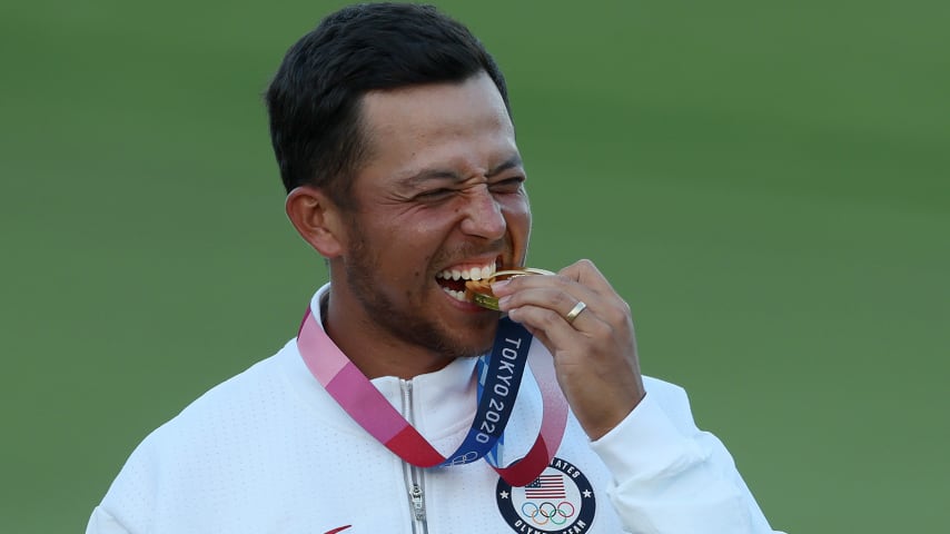 KAWAGOE, JAPAN - AUGUST 01: Xander Schauffele of Team United States celebrates with the gold medal during the medal ceremony after the final round of the Men's Individual Stroke Play on day nine of the Tokyo 2020 Olympic Games at Kasumigaseki Country Club on August 01, 2021 in Kawagoe, Saitama, Japan. (Photo by Mike Ehrmann/Getty Images)