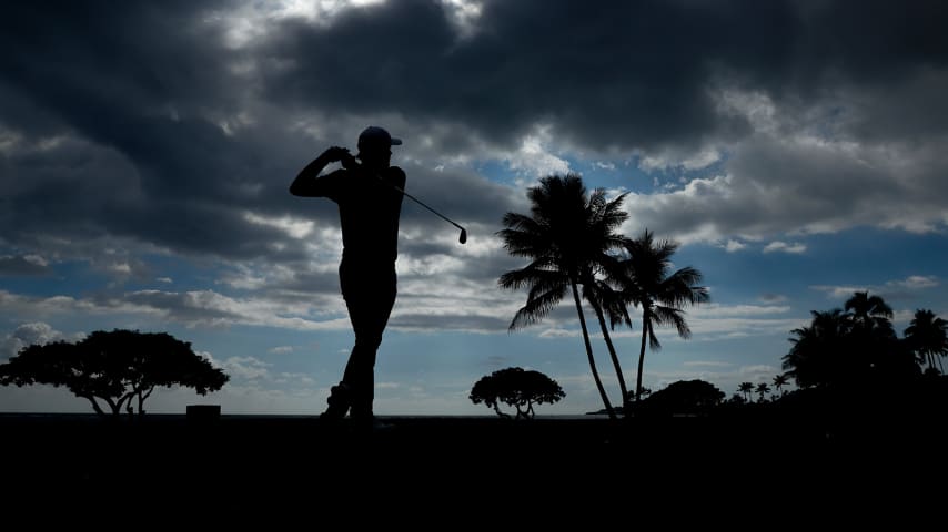 HONOLULU, HAWAII - JANUARY 13: Russell Henley of the United States plays his shot from the 17th tee during the Pro-Am Tournament prior to the Sony Open at Waialae Country Club on January 13, 2021 in Honolulu, Hawaii. (Photo by Cliff Hawkins/Getty Images)