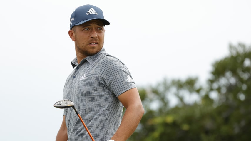 JERSEY CITY, NEW JERSEY - AUGUST 21: Xander Schauffele of the United States looks on after hitting his shot from the third tee during the third round of THE NORTHERN TRUST, the first event of the FedExCup Playoffs, at Liberty National Golf Club on August 21, 2021 in Jersey City, New Jersey. (Photo by Sarah Stier/Getty Images)