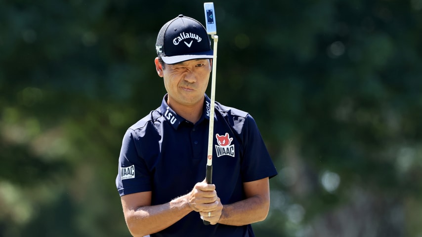 ATLANTA, GEORGIA - SEPTEMBER 04: Kevin Na lines up a putt on the first green during the third round of the TOUR Championship at East Lake Golf Club on September 04, 2021 in Atlanta, Georgia. (Photo by Sam Greenwood/Getty Images)