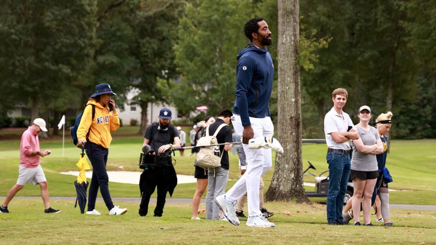 BURLINGTON, NORTH CAROLINA - OCTOBER 11: Fans and media follow J.R. Smith of the North Carolina A&T Aggies as he walks to the 13th hole during the Phoenix Invitational at Alamance Country Club on October 11, 2021 in Burlington, North Carolina. (Photo by Grant Halverson/Getty Images)