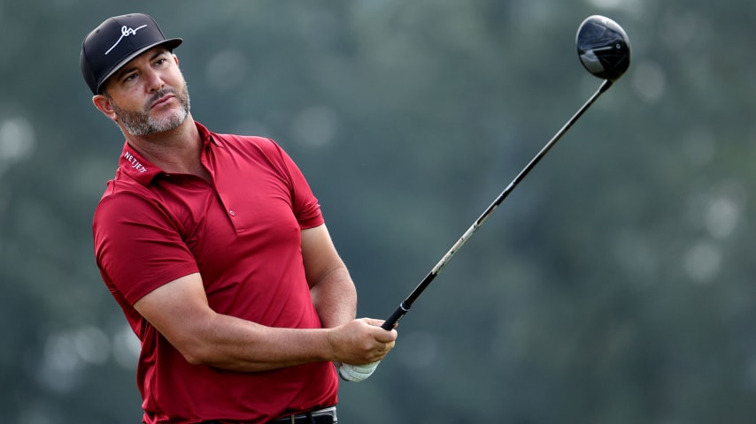 HOUSTON, TEXAS - NOVEMBER 11: Scott Piercy plays his shot from the tenth tee during the first round of the Houston Open at Memorial Park Golf Course on November 11, 2021 in Houston, Texas. (Photo by Andy Lyons/Getty Images)