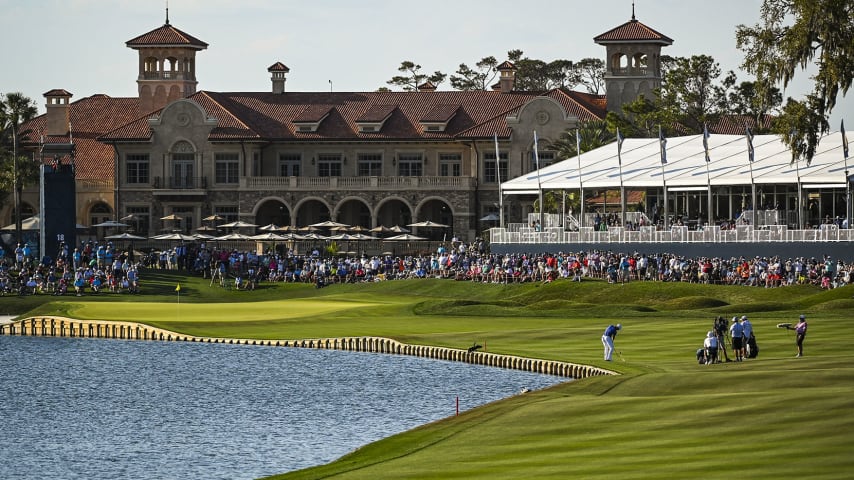 PONTE VEDRA BEACH, FL - MARCH 14:  Justin Thomas plays his approach shot near the water on the 18th hole fairway during the final round of THE PLAYERS Championship on the Stadium Course at TPC Sawgrass on March 14, 2021, in Ponte Vedra Beach, Florida. (Photo by Keyur Khamar/PGA TOUR via Getty Images)