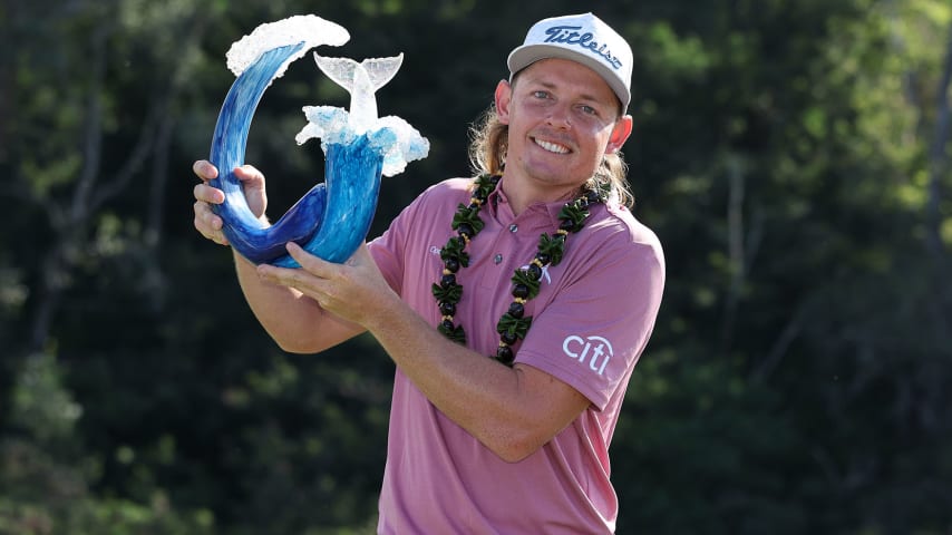 LAHAINA, HAWAII - JANUARY 09: Cameron Smith of Australia celebrates with the trophy after winning during the final round of the Sentry Tournament of Champions at the Plantation Course at Kapalua Golf Club on January 09, 2022 in Lahaina, Hawaii. (Photo by Gregory Shamus/Getty Images)