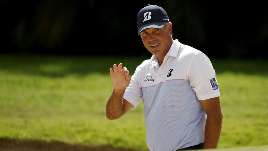 HONOLULU, HAWAII - JANUARY 16: Matt Kuchar of the United States waves from a bunker on the first green during the final round of the Sony Open in Hawaii at Waialae Country Club on January 16, 2022 in Honolulu, Hawaii. (Photo by Cliff Hawkins/Getty Images)