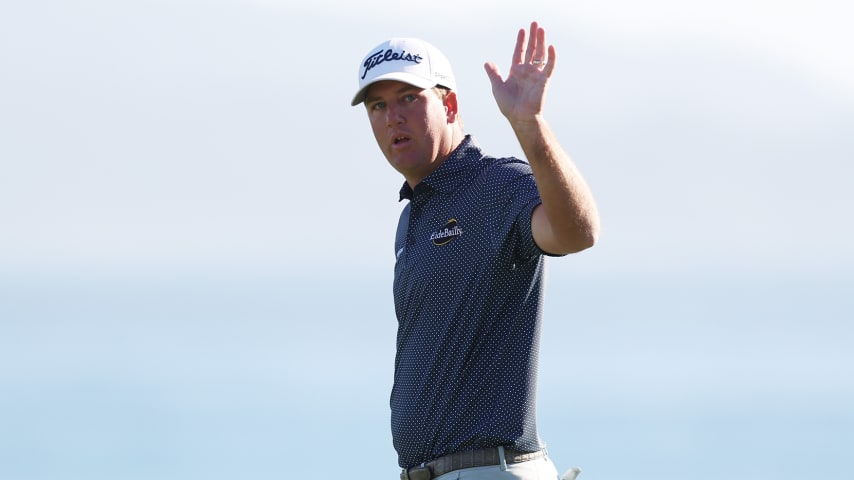 PEBBLE BEACH, CALIFORNIA - FEBRUARY 06: Tom Hoge of the United States reacts after finishing on the 18th green during the final round of the AT&T Pebble Beach Pro-Am at Pebble Beach Golf Links on February 06, 2022 in Pebble Beach, California. (Photo by Jed Jacobsohn/Getty Images)