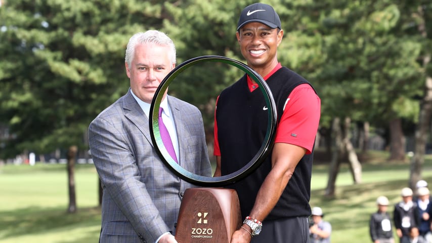 INZAI, JAPAN - OCTOBER 28: Tiger Woods of the United States and the PGA  Tour Executive Vice President Ty Votaw pose with the trophy after the award ceremony following the final round of the Zozo Championship at Accordia Golf Narashino Country Club on October 28, 2019 in Inzai, Chiba, Japan. (Photo by Chung Sung-Jun/Getty Images)