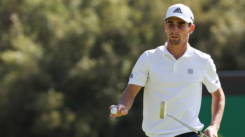 PACIFIC PALISADES, CALIFORNIA - FEBRUARY 20: Joaquin Niemann of Chile waves after making a putt for birdie on the eighth green during the final round of The Genesis Invitational at Riviera Country Club on February 20, 2022 in Pacific Palisades, California. (Photo by Rob Carr/Getty Images)