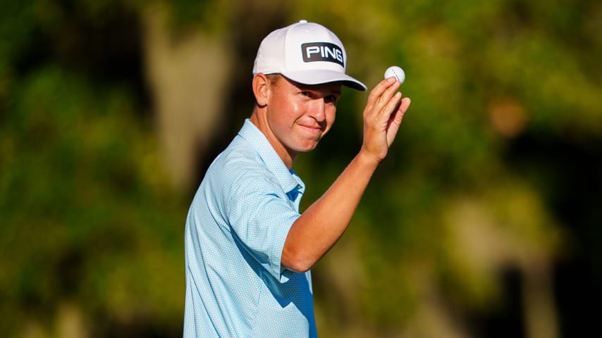 SAVANNAH, GA - NOVEMBER 08:  Sam Stevens smiles with his ball on the 18 green after making a birdie putt during the final round of the Korn Ferry Tour Qualifying Tournament Final Stage at Landings Club-Marshwood Course on November 8, 2021 in Savannah, Georgia. (Photo by Andrew Wevers/PGA TOUR via Getty Images)