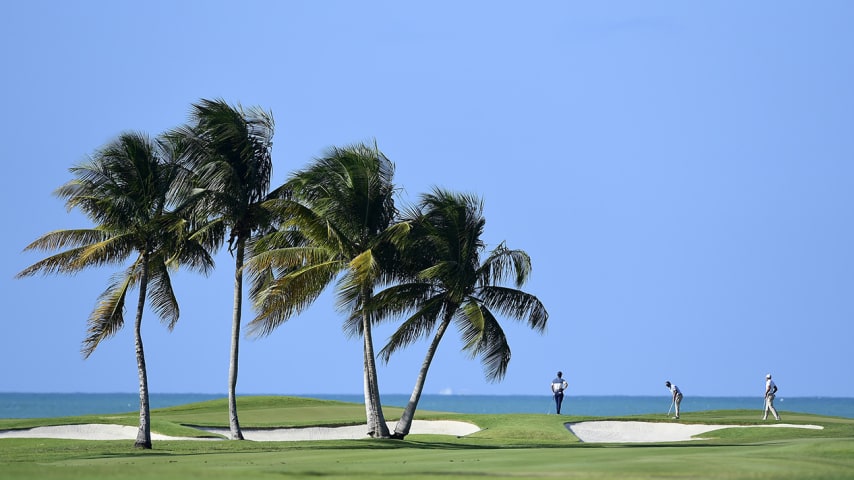 RIO GRANDE, PUERTO RICO - FEBRUARY 21: Golfers walk the 12th green during the second round of the Puerto Rico Open at Grand Reserve Country Club on February 21, 2020 in Rio Grande, Puerto Rico. (Photo by Jared C. Tilton/Getty Images)