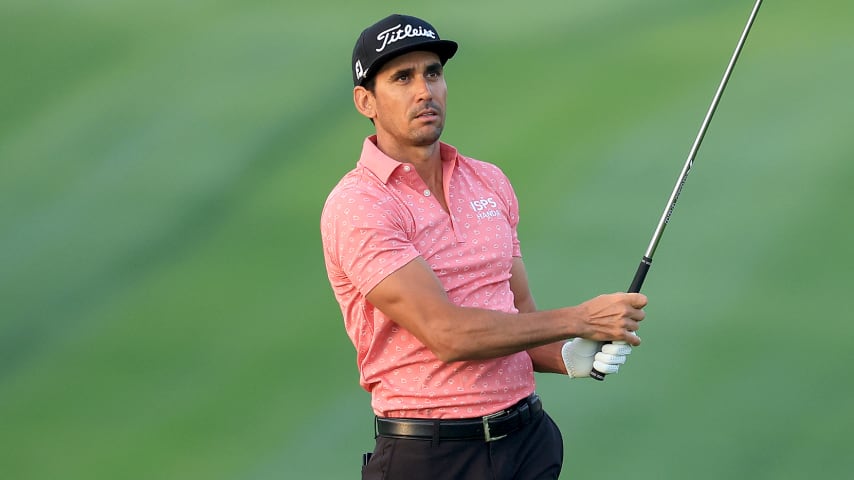 DUBAI, UNITED ARAB EMIRATES - JANUARY 29: Rafa Cabrera Bello of Spain plays his second shot on the par 4, first hole during the third round of the Slync.io Dubai Desert Classic on The Majlis Course at The Emirates Golf Club on January 29, 2022 in Dubai, United Arab Emirates. (Photo by David Cannon/Getty Images)