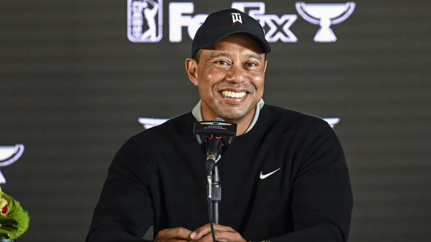 PACIFIC PALISADES, CA - FEBRUARY 16:  Tournament host Tiger Woods smiles at a press conference during practice for The Genesis Invitational at Riviera Country Club on February 16, 2022 in Pacific Palisades, California. (Photo by Keyur Khamar/PGA TOUR via Getty Images)