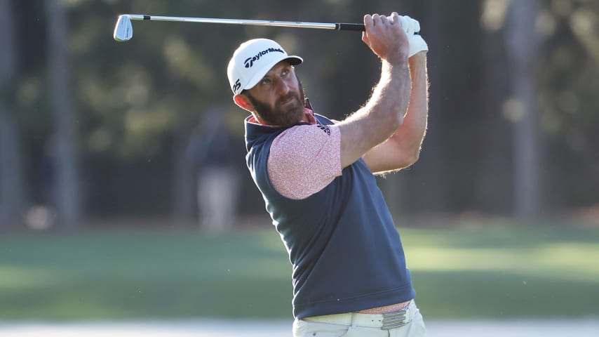 PONTE VEDRA BEACH, FLORIDA - MARCH 12: Dustin Johnson of the United States plays a shot on the seventh hole during the second round of THE PLAYERS Championship on the Stadium Course at TPC Sawgrass on March 12, 2022 in Ponte Vedra Beach, Florida. (Photo by Sam Greenwood/Getty Images)