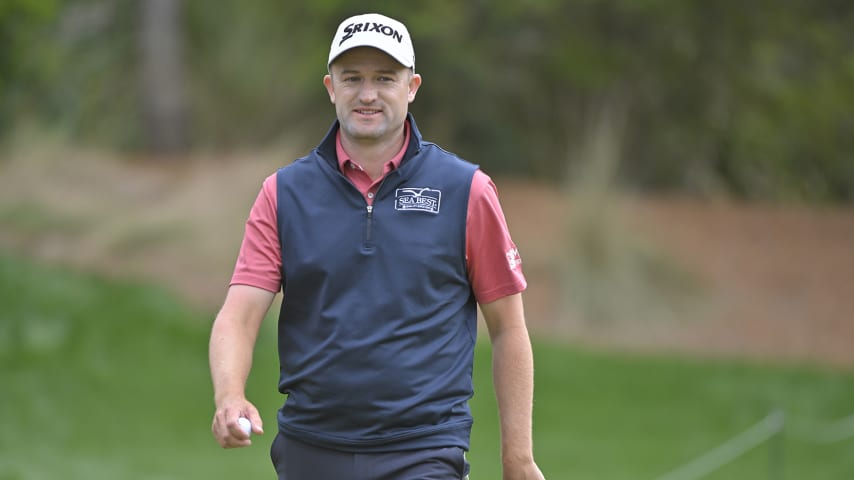 PONTE VEDRA BEACH, FL - MARCH 14: Russell Knox of Scotland walks off the eighth green during the final round of THE PLAYERS Championship on THE PLAYERS Stadium Course at TPC Sawgrass on March 14, 2022, in Ponte Vedra Beach Florida. (Photo by Ben Jared/PGA TOUR via Getty Images)