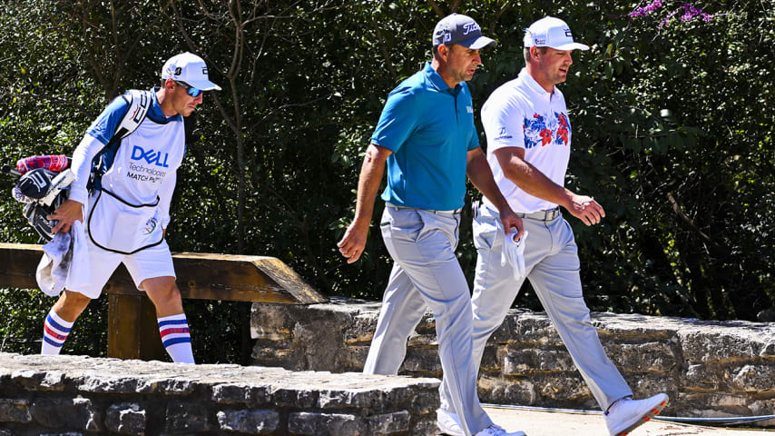 AUSTIN, TX - MARCH 23:  Bryson DeChambeau and Richard Bland of England during Round 1 of the World Golf Championships-Dell Technologies Match Play at Austin Country Club on March 23, 2022 in Austin, Texas. (Photo by Tracy Wilcox/PGA TOUR via Getty Images)