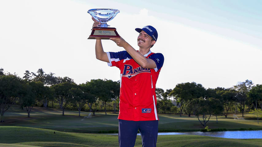 PANAMA, CIUDAD DE, PANAMA - FEBRUARY 06: Carson Young celebrates with the winner's trophy after winning The Panama Championship at Panama Golf Club on February 6, 2022 in Panama City, Panama. (Photo by Buda Mendes/Getty Images)