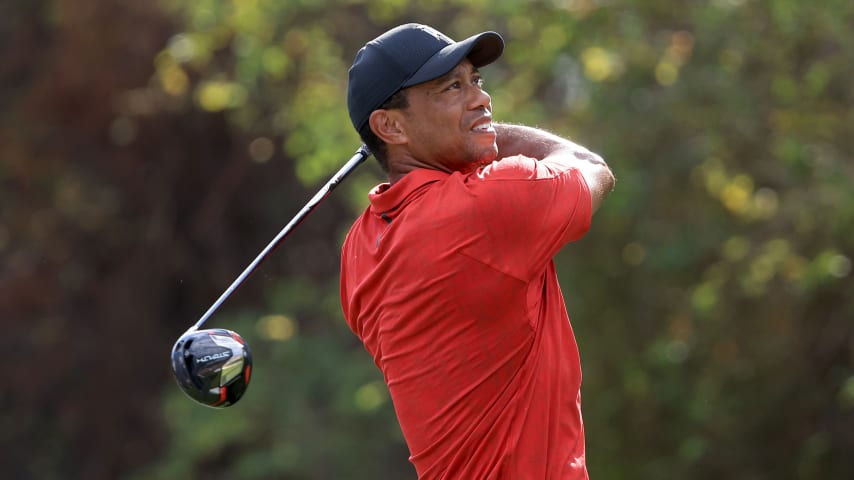 ORLANDO, FLORIDA - DECEMBER 19: Tiger Woods plays a shot on the 12th hole during the final round of the PNC Championship at the Ritz Carlton Golf Club Grande Lakes   on December 19, 2021 in Orlando, Florida. (Photo by Sam Greenwood/Getty Images)