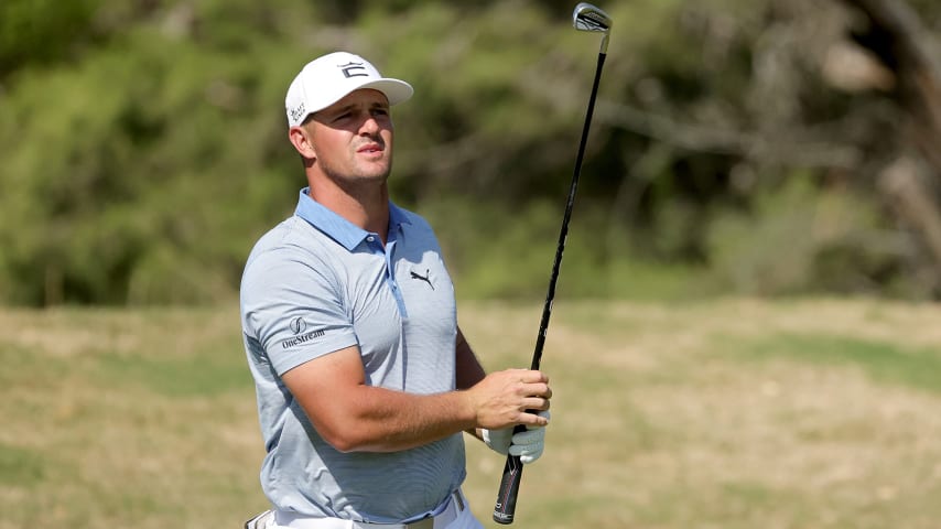 SAN ANTONIO, TEXAS - APRIL 01: Bryson DeChambeau follows his shot from the 13th tee during the second round of the Valero Texas Open at TPC San Antonio on April 01, 2022 in San Antonio, Texas. (Photo by Stacy Revere/Getty Images)