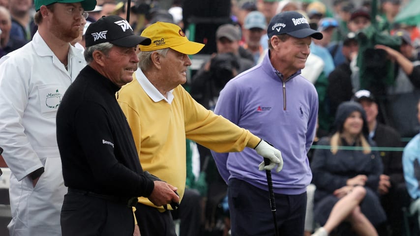 AUGUSTA, GEORGIA - APRIL 07: (L-R) Honorary starters and Masters champions Gary Player of South Africa, Jack Nicklaus, and Tom Watson look on from the first tee during the opening ceremony prior to the start of the first round of the Masters at Augusta National Golf Club on April 07, 2022 in Augusta, Georgia. (Photo by Gregory Shamus/Getty Images)