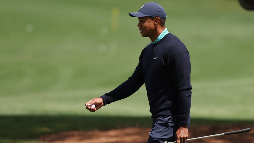 AUGUSTA, GEORGIA - APRIL 08: Tiger Woods walks across the driving range during the second round of The Masters at Augusta National Golf Club on April 08, 2022 in Augusta, Georgia. (Photo by Gregory Shamus/Getty Images)