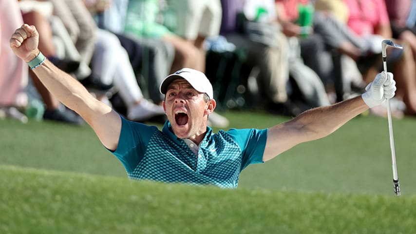 AUGUSTA, GEORGIA - APRIL 10: Rory McIlroy of Northern Ireland reacts after chipping in for birdie from the bunker on the 18th green during the final round of the Masters at Augusta National Golf Club on April 10, 2022 in Augusta, Georgia. (Photo by Gregory Shamus/Getty Images)