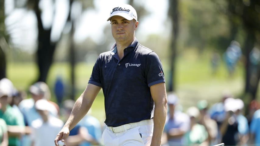 PALM HARBOR, FLORIDA - MARCH 17: Justin Thomas of the United States walks onto the sixth green during the first round of the Valspar Championship on the Copperhead Course at Innisbrook Resort and Golf Club on March 17, 2022 in Palm Harbor, Florida. (Photo by Cliff Hawkins/Getty Images)