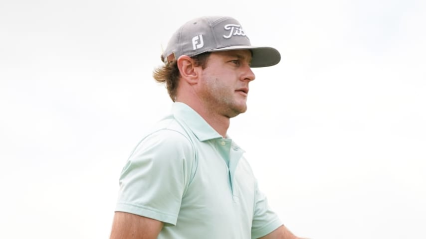 ARLINGTON, TX - APRIL 15: Chase Parker walks the course during the third round of the Veritex Bank Championship at Texas Rangers Golf Club on April 15, 2022 in Arlington, Texas. (Photo by Alex Bierens de Haan/Getty Images)