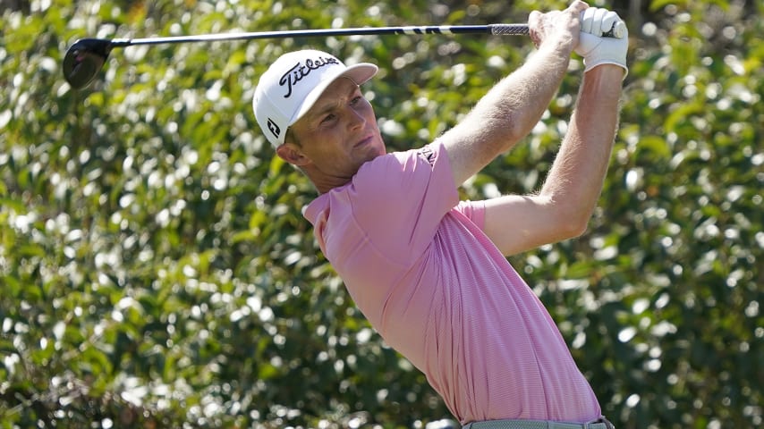 AUSTIN, TEXAS - MARCH 26: Will Zalatoris of the United States plays his shot from the ninth tee in his quarterfinal match against  Kevin Kisner of the United States on the fourth day of the World Golf Championships-Dell Technologies Match Play at Austin Country Club on March 26, 2022 in Austin, Texas. (Photo by Chuck Burton/Getty Images)