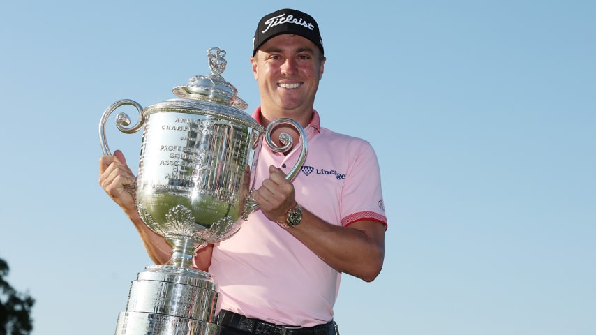 TULSA, OKLAHOMA - MAY 22: Justin Thomas of the United States poses with the Wanamaker Trophy after putting in to win on the 18th green, the third playoff hole during the final round of the 2022 PGA Championship at Southern Hills Country Club on May 22, 2022 in Tulsa, Oklahoma. (Photo by Christian Petersen/Getty Images)