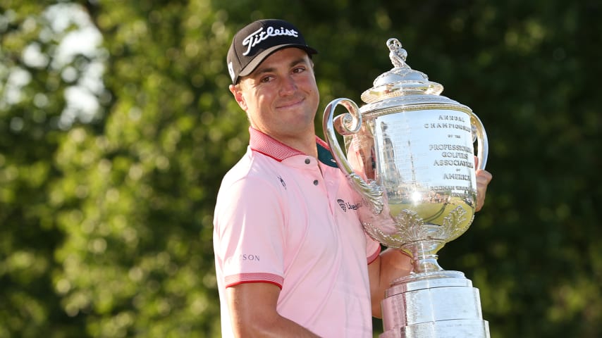 TULSA, OKLAHOMA - MAY 22: Justin Thomas of the United States poses with the Wanamaker Trophy after putting in to win on the 18th green, the third playoff hole during the final round of the 2022 PGA Championship at Southern Hills Country Club on May 22, 2022 in Tulsa, Oklahoma. (Photo by Ezra Shaw/Getty Images)